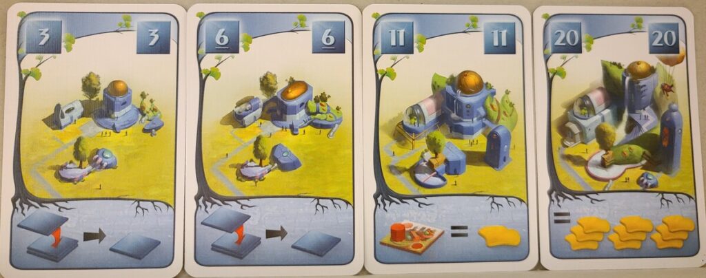 Blue cards showing the artwork. The buildings on the cards get more elaborate as the numbers go up.